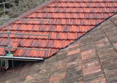 Weathered tiled roof showing dirt and surface staining before cleaning