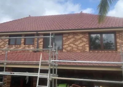 Residential tiled roof undergoing roofing work in Shellharbour