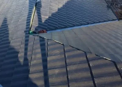 Completed grey tile roof restoration on a residential property