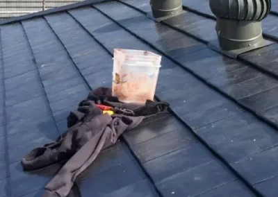 Flat roof repair work around roof vents and penetrations
