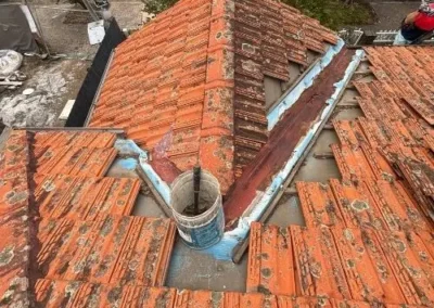 Terracotta tiled roof showing valley and drainage details